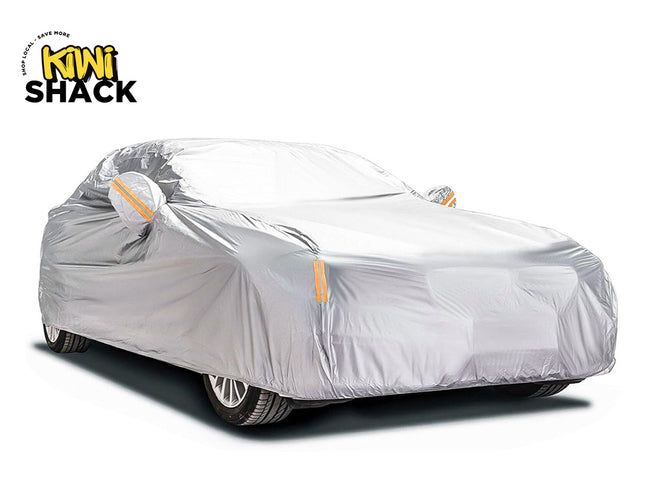 A silver car cover fitted over a car, shown on a white background with the KINI SHACK logo in the top-left corner.