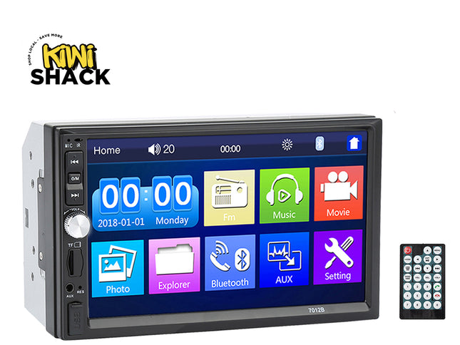 A black car stereo head unit with a colorful touchscreen display and a separate black remote control, shown on a white background with the Kiwi Shack logo in the top left corner.