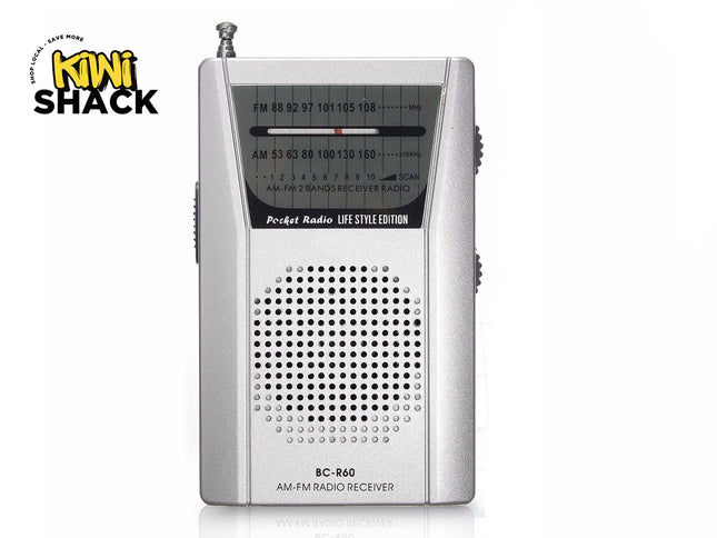 A silver BC-R60 AM-FM pocket radio receiver featuring a retractable antenna, a circular speaker grille, and an analog tuning dial face against a white background. A "Kiwi Shack" logo appears in the top-left corner.