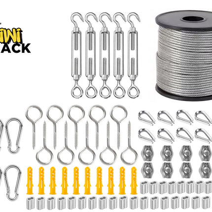 Stainless steel wire rope hanging and rigging hardware kit including a large spool of wire cable top right, five hook-and-eye turnbuckles, snap hooks, eye bolts, wire thimbles, rope clamps, yellow wall anchors, and aluminum crimping sleeves, with Kiwi Shack logo in top left.