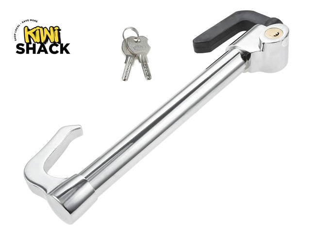 A chrome-plated steering wheel lock bar with hooks at both ends, a built-in key cylinder lock, and two matching keys against a white background, featuring the "Kiwi Shack" logo in the upper left corner.