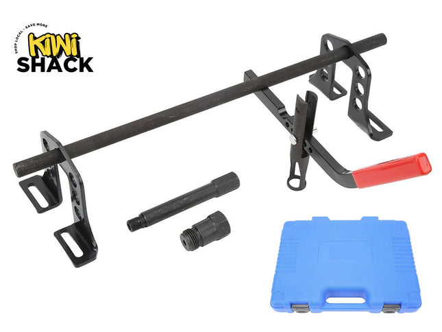 Kiwi Shack automotive specialty tool kit featuring mounting brackets, a threaded bar, puller components, and a blue blow-molded case.