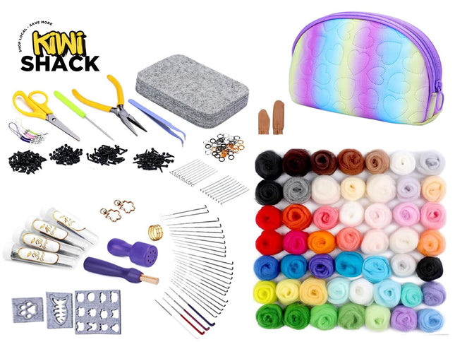 A Kiwi Shack craft kit laid out on a white background, including a rainbow-colored zip pouch, a gray felt block, scissors, tweezers, metal findings, wooden sticks, needles, stamps, and many rolled yarn or fabric colors arranged in a grid.