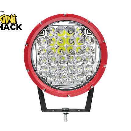 Round LED work light with red rim and black base on a white background, branded with Kini Shack.