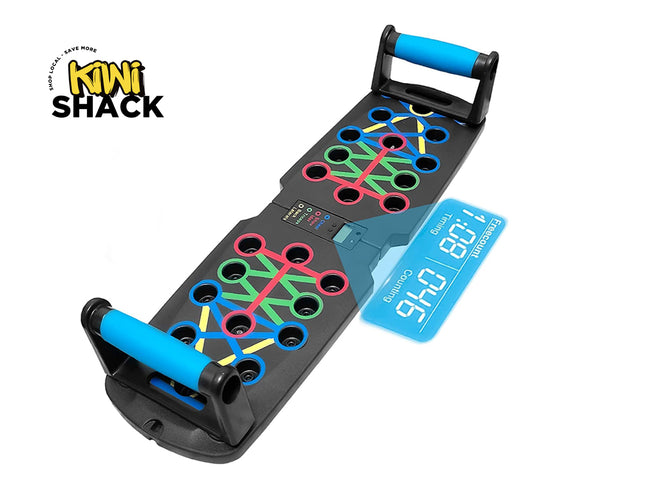 A black multi-color push-up board with blue padded handles and a digital counting screen display, set against a white background. A "Kiwi Shack" logo appears in the top-left corner.