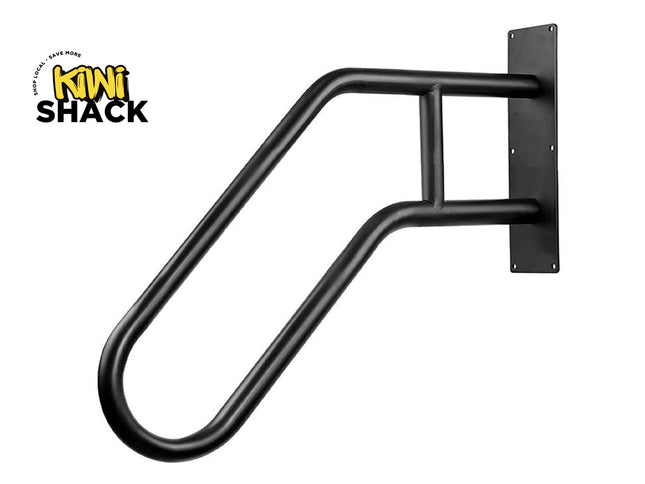 Black metal handrail attached to a white wall with 'Kiwi Shack' branding.
