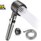 A gunmetal gray handheld shower head spraying water, accompanied by a matching wall mount bracket and a coiled stainless steel shower hose below, set against a white background with the "Kiwi Shack" logo in the top left corner.