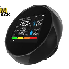 Black digital air quality monitor with colorful display on a white background, featuring the Kiwi Shack logo.