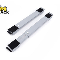 A pair of adjustable gray appliance roller stands or furniture moving bars with black non-slip pads at each end, featuring a "Kiwi Shack" logo in the top left corner.