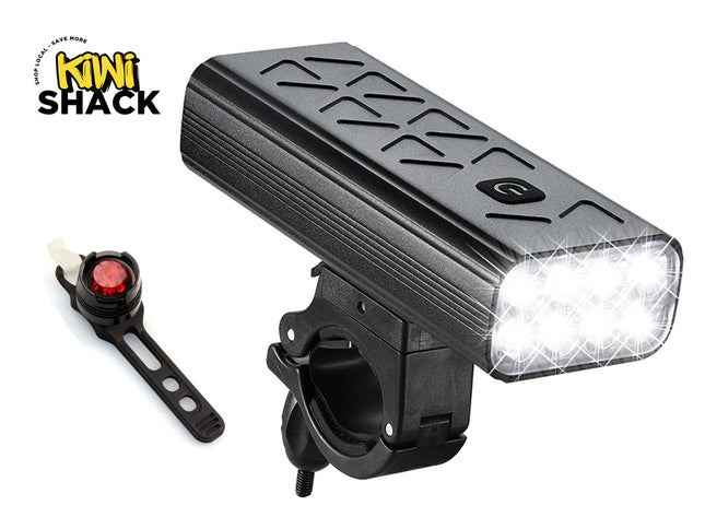 Bicycle light with red reflector on a white background, featuring Kiwi Shack logo.