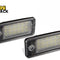 Two rectangular LED license plate lights with clear textured lenses and black housings, featuring the "Kiwi Shack" logo in the top-left corner.