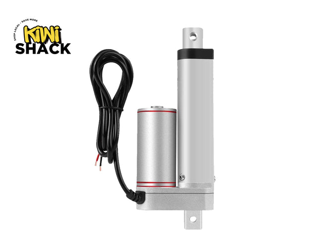 A silver aluminum mini electric linear motor with an attached black power cable, shown against a plain white background with the 'Mini Shack' brand logo in the top-left corner.