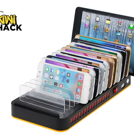 Multi-device charging station with smartphones and a tablet on a white background, featuring the Kiwi Shack brand.