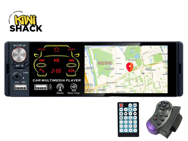 A car multimedia player head unit with a large touchscreen display showing a map, alongside a separate remote control and a black mounting bracket. The head unit has physical controls on the left including a silver rotary knob, USB ports, and audio jacks.