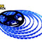 A spool of glowing blue LED strip lights uncoiled against a white background, with the "Kiwi Shack" logo visible in the upper left corner.