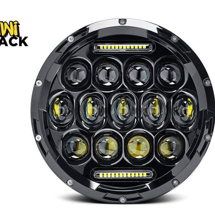 Round LED light with multiple lenses on a white background, featuring the Kiwi Shack logo.