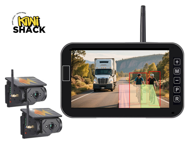 Wireless AI BSD / truck reversing camera system featuring a top-antenna monitor showing a front-road view with cyclist detection bounding boxes, two solar-powered wireless cameras on the left, and Kiwi Shack logo in top left.