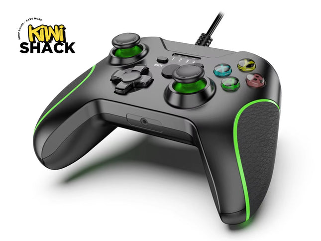 Black gaming controller with green accents on a white background, featuring the brand 'Kiwi Shack'.