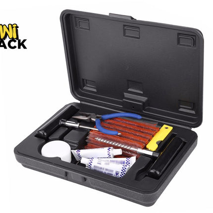 A black plastic storage case opened to reveal a complete tire repair kit, including a T-handle insert tool, spiral probe tool, pliers, rubber cement tubes, a jar of lubricant, and multiple rows of brown tire repair plugs. A "Kiwi Shack" logo is visible in the top left corner.