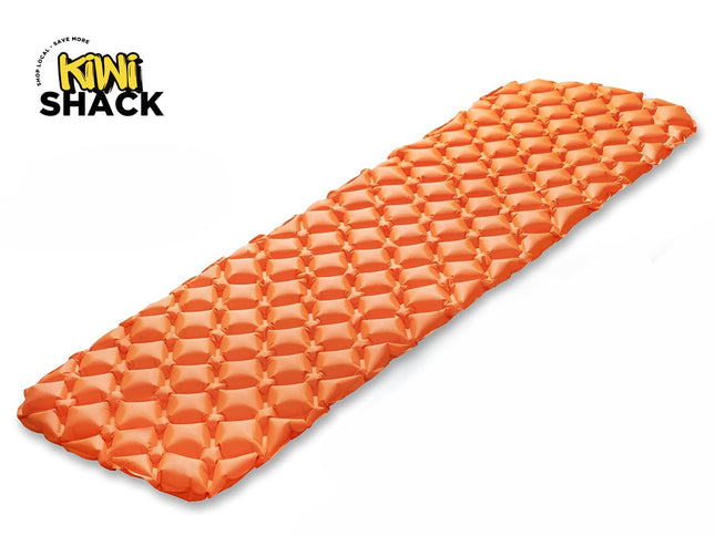 Kiwi Shack lightweight inflatable orange camping sleeping mat with ergonomic honeycomb air cells for backpacking and outdoor travel.