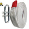 Kiwi Shack white slackline or tow strap rolled up with a red reinforced end loop and two silver shackles.