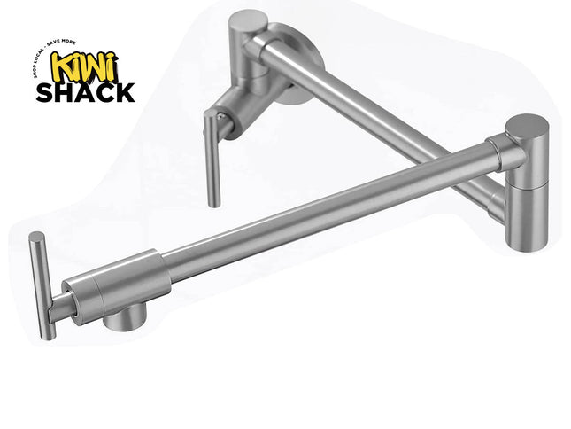 Brushed nickel wall-mounted articulating pot filler faucet with double-jointed swing arms, vertical handle levers at the wall mount and nozzle head, and Kiwi Shack logo in top left.