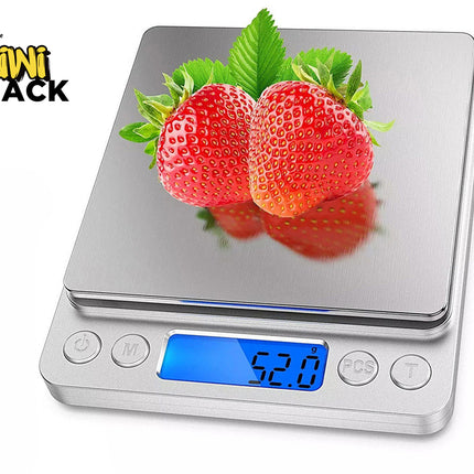 Digital kitchen scale with two strawberries on a white background, featuring the Kiwi Shack brand.