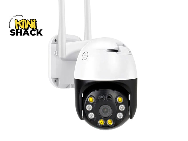 A white and black dome security camera with two antennas, shown against a plain white background with a Kiwi Shack logo in the top-left corner.