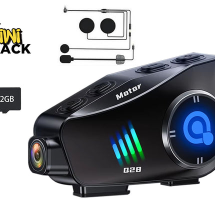 Black electronic device with digital display and camera lens, branded 'Motor', on a white background with 'Kiwi Shack' logo.