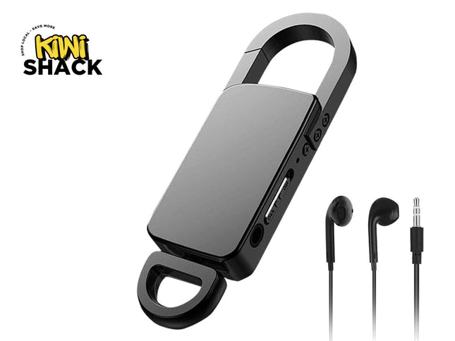 A sleek black and gray digital voice recorder with a carabiner clip design and side control buttons, displayed alongside a pair of black wired earphones, with a "Kiwi Shack" logo in the top left corner.
