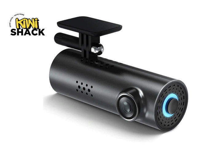 A black cylindrical dash cam with a mounting bracket on top, featuring a blue illuminated ring around the rear lens and a visible Kiwi Shack logo in the top-left corner.