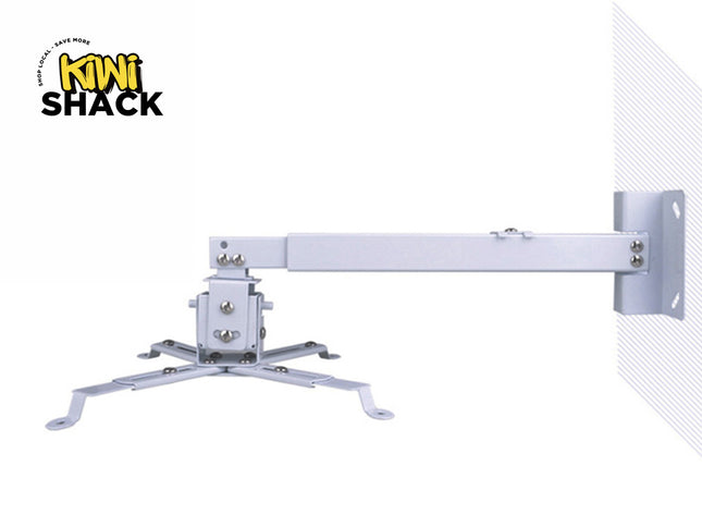 An adjustable white wall-mounted projector bracket with an extension arm and mounting spider legs, featuring the "Kiwi Shack" logo in the top-left corner.