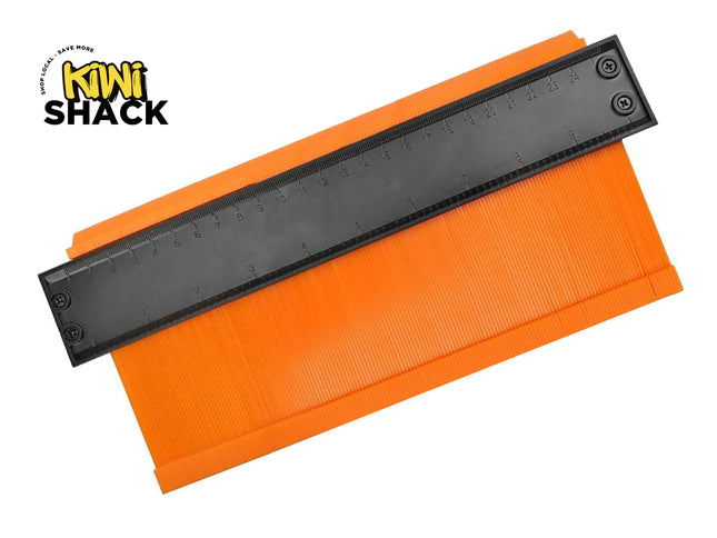 An orange plastic contour gauge profile tool featuring a black central locking handle and an integrated measurement scale against a white background, featuring the "Kiwi Shack" logo in the upper left corner.