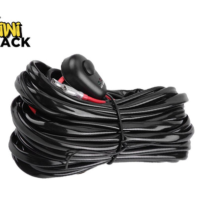 A coiled black electrical wiring harness with an inline push-button power switch and metal connectors, featuring the "Kiwi Shack" logo in the top-left corner.
