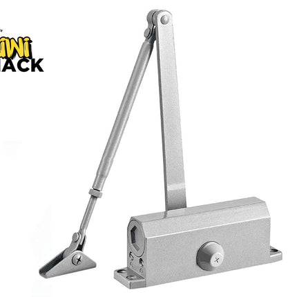 Metal door closer on a white background with 'Kiwi Shack' branding.