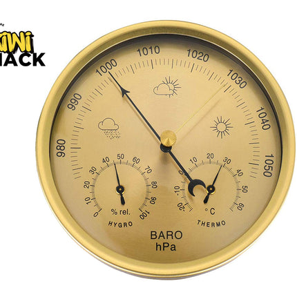 Gold barometer with weather symbols on a white background, featuring the Kiwi Shack logo.