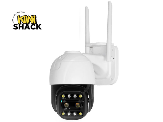 A white and black wireless security camera with two antennas, shown against a plain white background with a Kiwi Shack logo in the top-left corner.