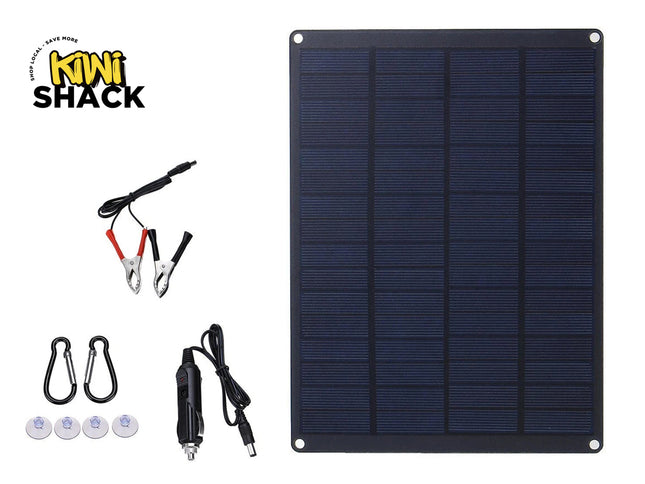 Solar panel with accessories on a white background, featuring the Kiwi Shack brand.