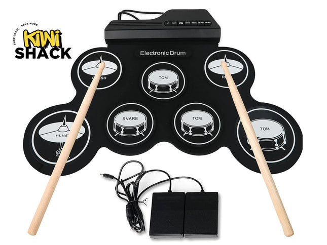 Electronic drum set with drum pads, sticks, and power adapter on a white background, branded 'Kiwi Shack'.