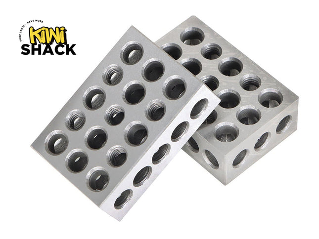 A pair of matched precision steel 1-2-3 blocks featuring multiple threaded and unthreaded cross-drilled holes, featuring the "Kiwi Shack" logo in the top-left corner.