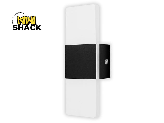 White and black wall light fixture with Kiwi Shack logo on a white background