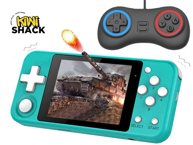 Teal-green handheld retro video game console displaying a tank battle game on its screen, accompanied by a separate black wired game controller with blue and red accent rings around the D-pad and action buttons, featuring the Kiwi Shack logo watermark.