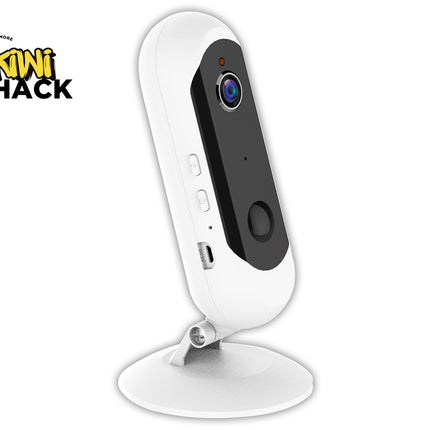 White camera on a stand with 'Kiwi Shack' branding on a white background