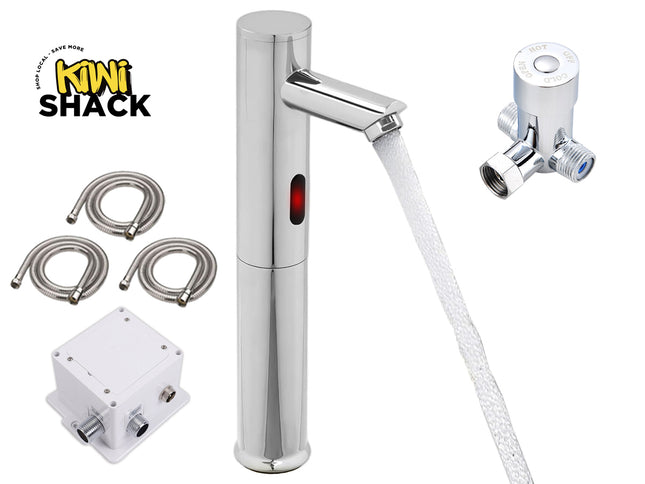 A chrome single-handle automatic感应 faucet with a water stream, shown with a wall valve, four metal hose sections, and a white electrical box on a white background. The Kiwi Shack logo is visible in the top left.