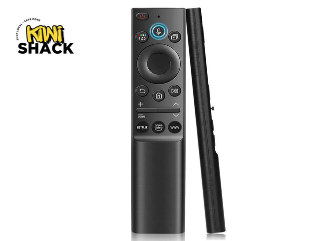 Slim metallic-finish smart TV voice remote control shown face-on and profile view, featuring a circular D-pad, blue-ringed voice/mic button, shortcut streaming service buttons for Netflix, Prime Video, and WWW, with Kiwi Shack logo in top left.