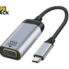 A silver and black USB-C to VGA adapter cable labeled "VGA 1080P" on the housing, connecting a female VGA port on the left to a male USB-C connector on the right, featuring a "Kiwi Shack" logo in the top left corner.
