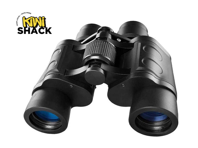 Black binoculars with blue lenses on a white background, featuring the Kinni Shack logo.