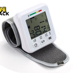 Wrist blood pressure monitor with digital display on a white background, branded 'Kiwi Shack'.