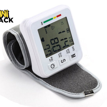 Wrist blood pressure monitor with digital display on a white background, branded 'Kiwi Shack'.