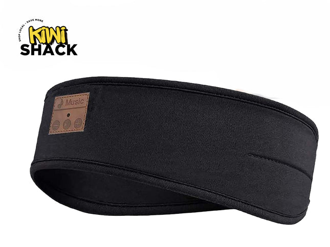 A black fabric Bluetooth sleep headband with a brown control panel patch labeled "Music" on the front left against a white background. A "Kiwi Shack" logo appears in the top-left corner.